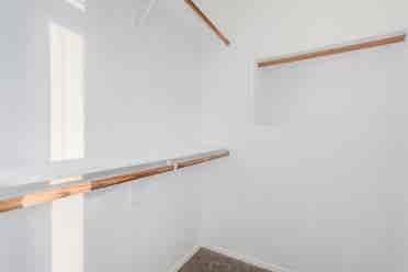 Two story with rooms for rent.