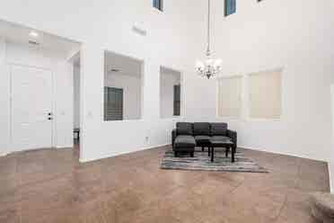 Two story with rooms for rent.