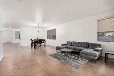 Two story with rooms for rent.