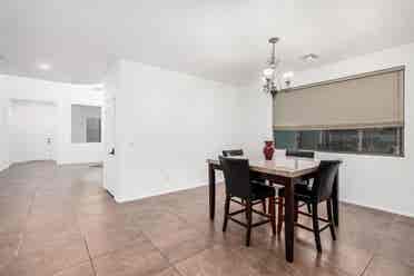 Two story with rooms for rent.