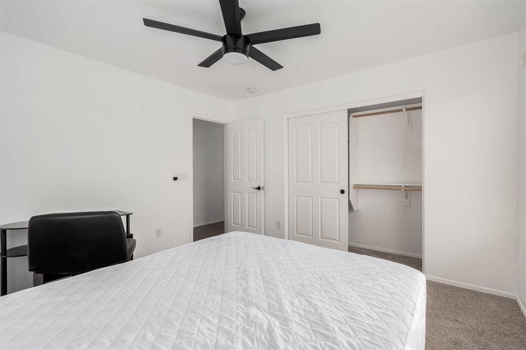 Two story with rooms for rent.