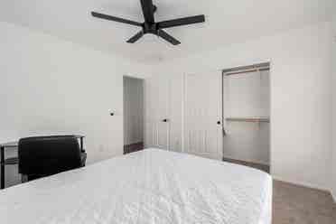 Two story with rooms for rent.