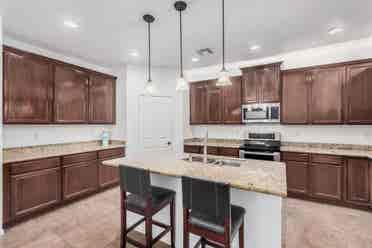 Two story with rooms for rent.