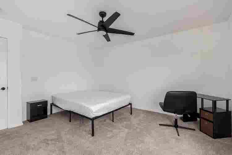 Two story with rooms for rent.