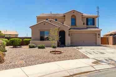 Two story with rooms for rent.