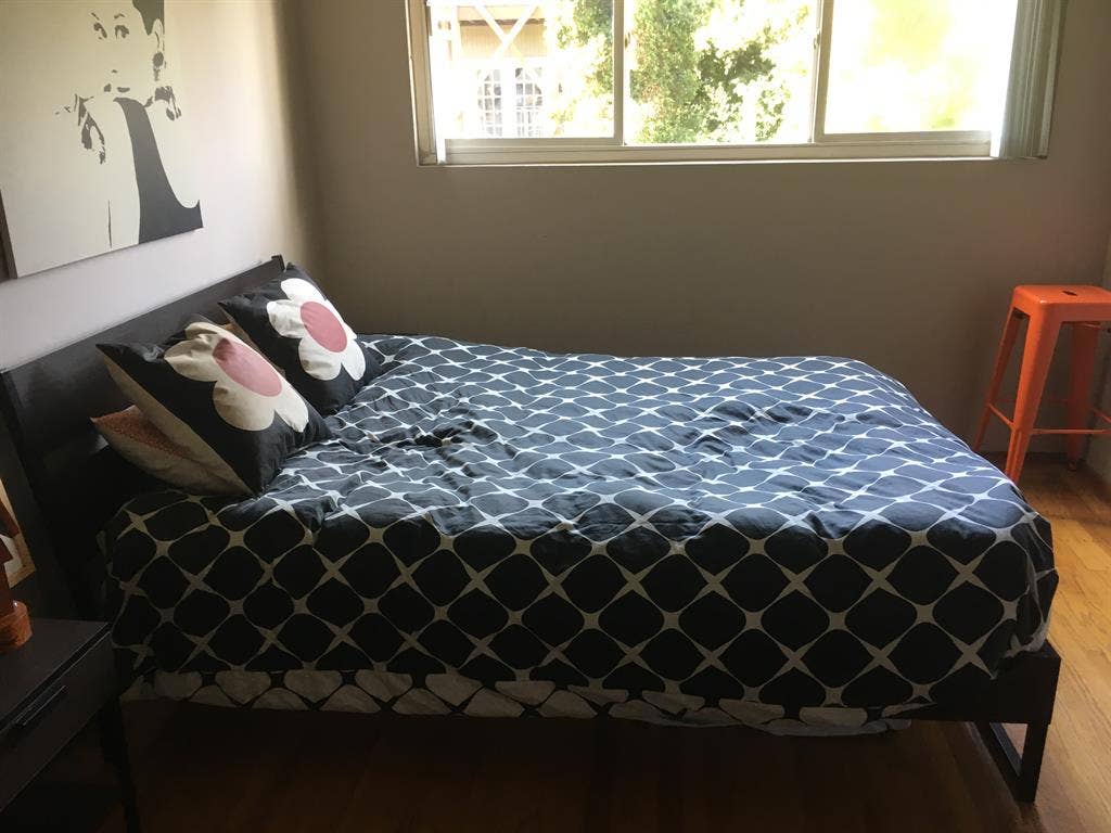 Sunny bedroom in a cozy flat