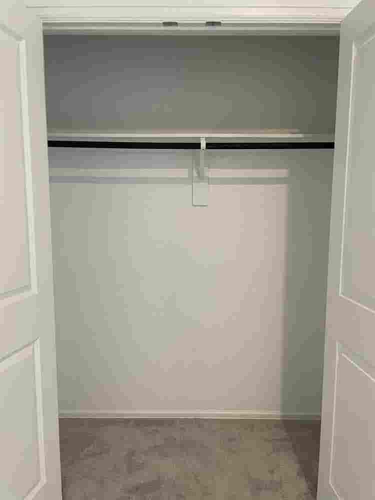 Unfurnished room with private sink