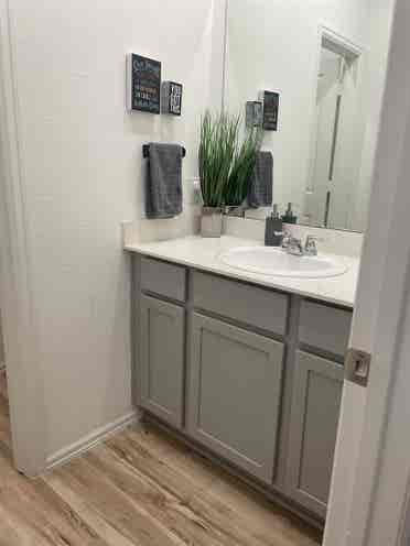 Unfurnished room with private sink