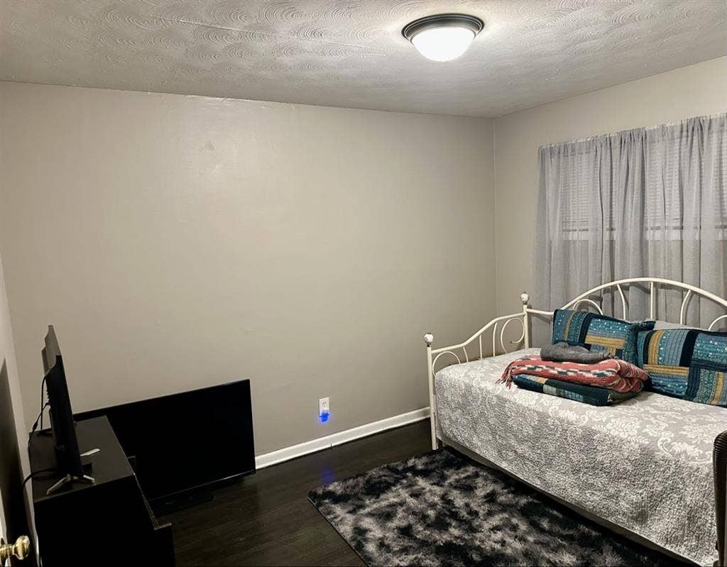 Bedroom and bathroom in home.