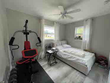Furnished bedroom, shared bathroom
