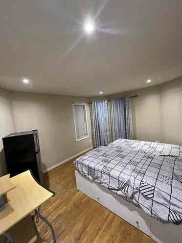 Large bedroom with two single beds.