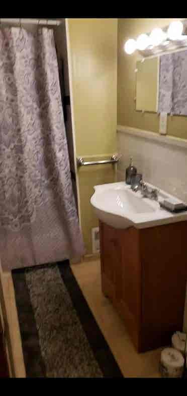 Room with shared bathroom