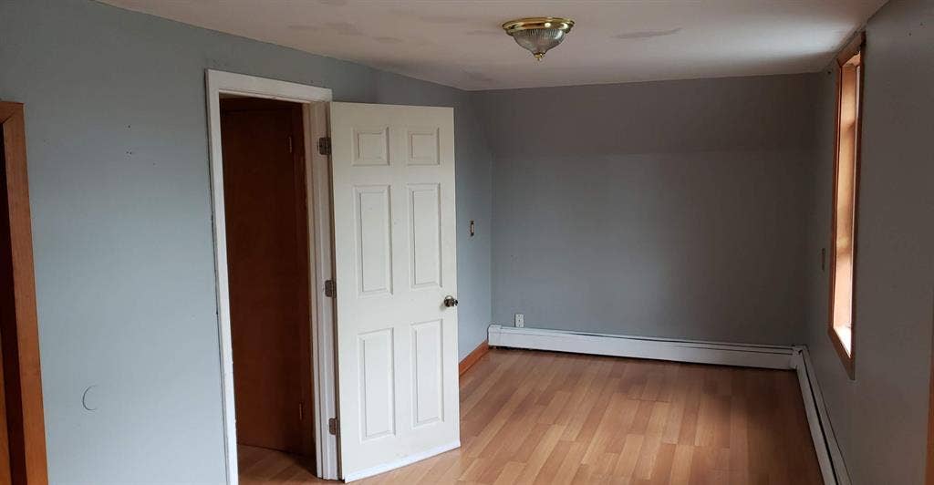Room with shared bathroom