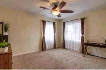 large room with shared bathroom
