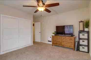 large room with shared bathroom