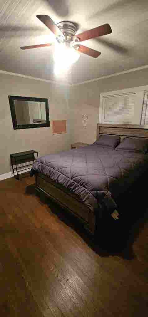 Bedroom with shared bathroom