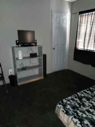 A Room w/ Bed, TV and Closet