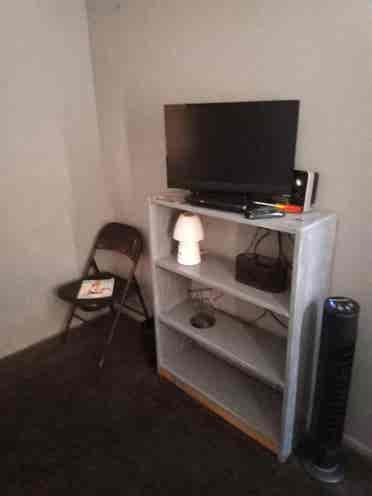 A Room w/ Bed, TV and Closet