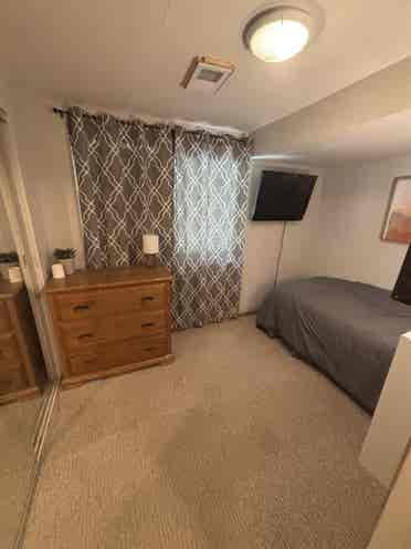 Lower level with private bathroom.