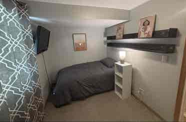 Lower level with private bathroom.