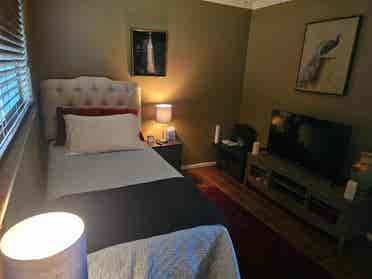 Room for rent in a shared condo.