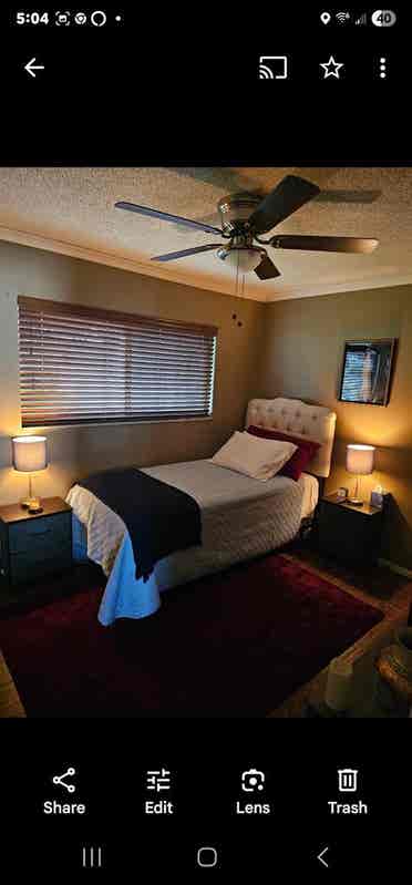 Room for rent in a shared condo.