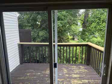 Unfurnished bedroom with balcony