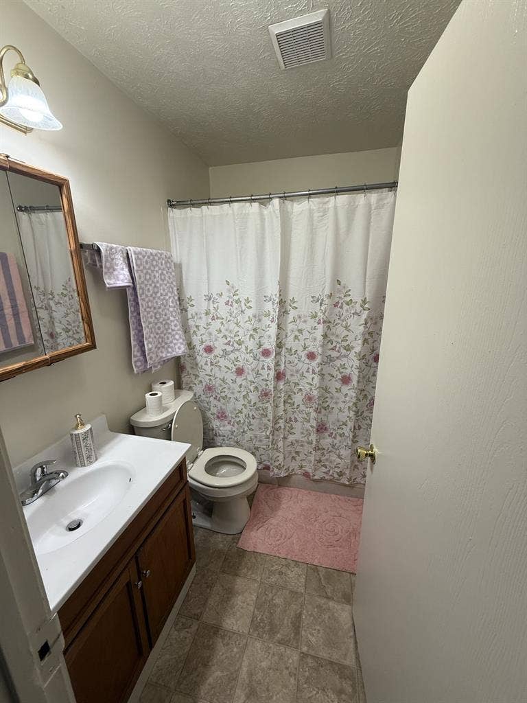 Unfurnished bedroom with balcony