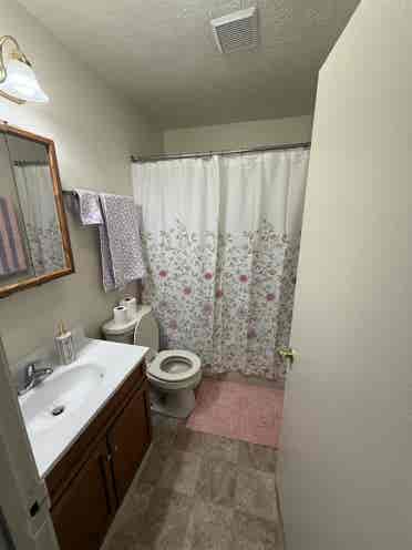 Unfurnished bedroom with balcony
