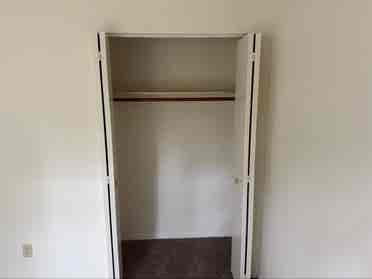 Unfurnished bedroom with balcony