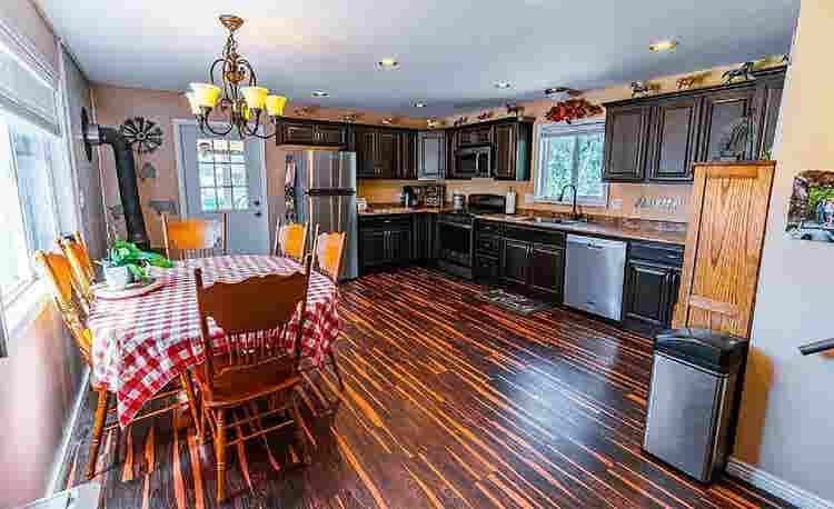 Rural home between forested hills