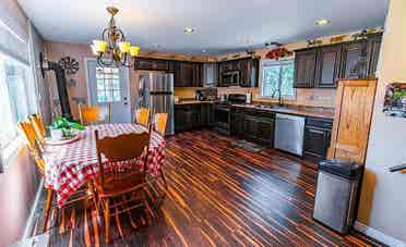 Rural home between forested hills