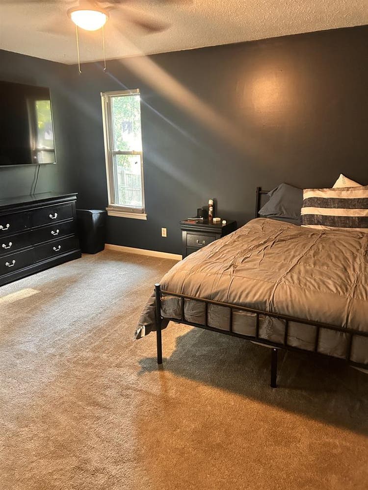Furnished bedroom & living space