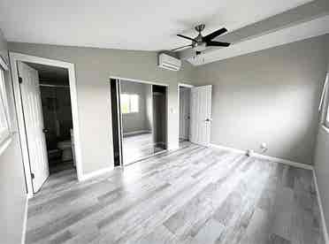 Master bedroom w/ private bathroom