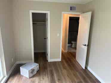 Wood floor bedroom w/great daylight