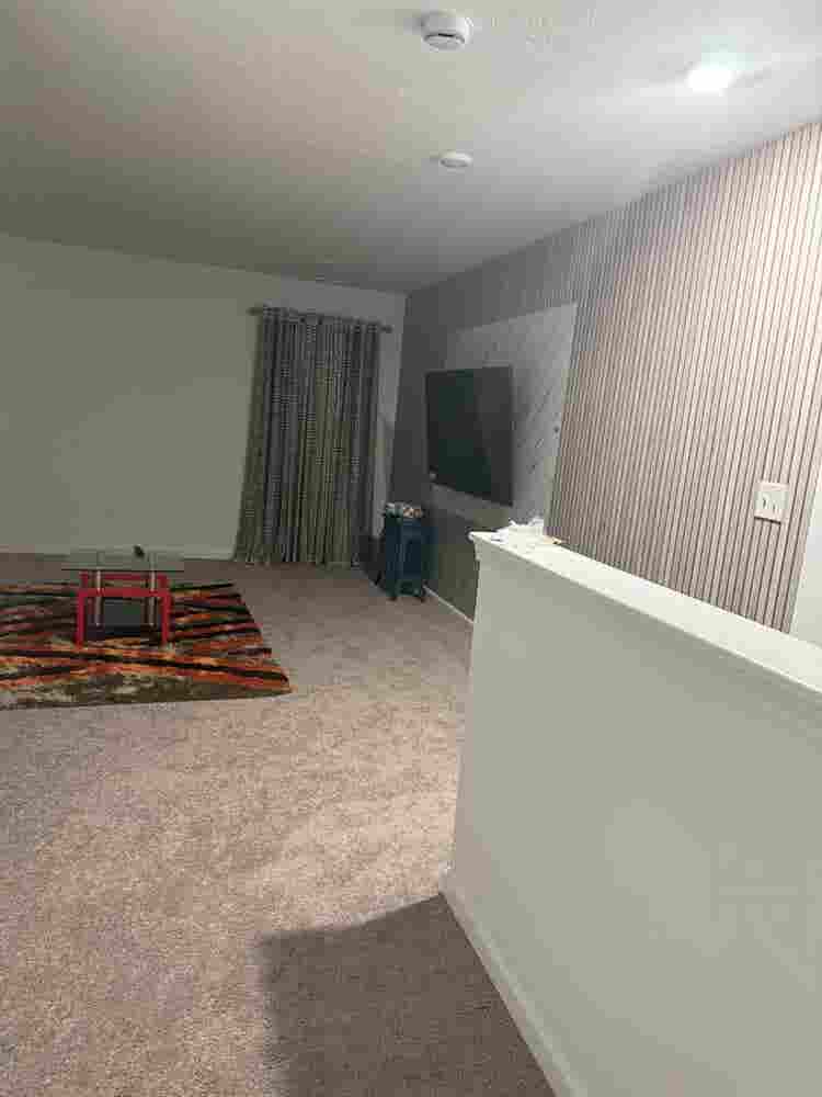 A bedroom with loft upstairs