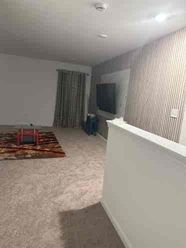 A bedroom with loft upstairs