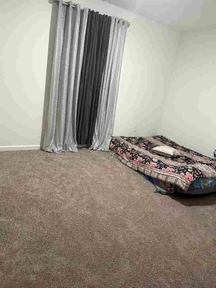 A bedroom with loft upstairs