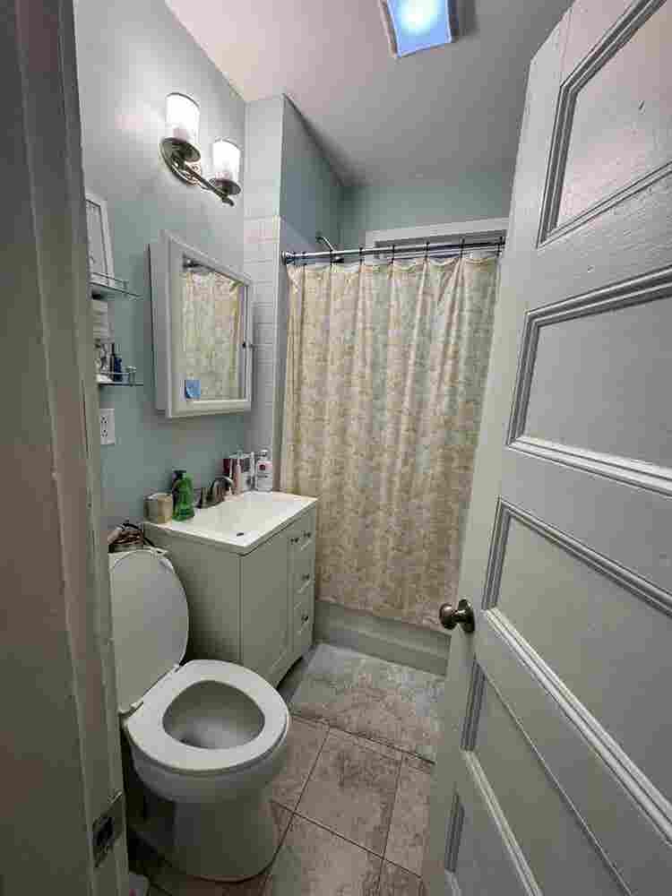 1 Large Bedroom w/ Shared Bathroom