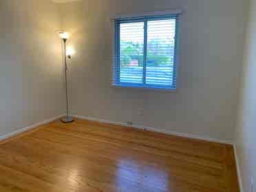bedroom with shared bathroom