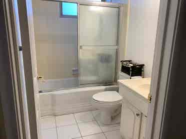 bedroom with shared bathroom