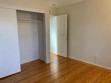 bedroom with shared bathroom