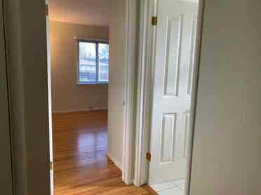 bedroom with shared bathroom