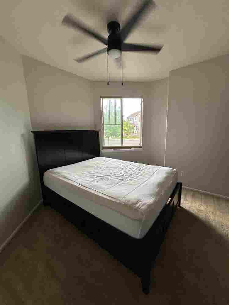 Furnished bedroom in large home