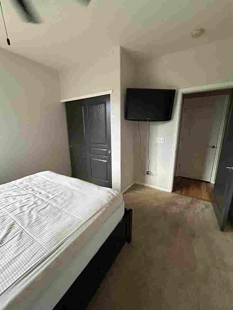 Furnished bedroom in large home