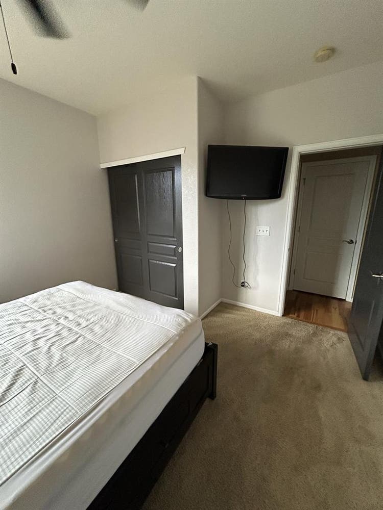 Furnished bedroom in large home
