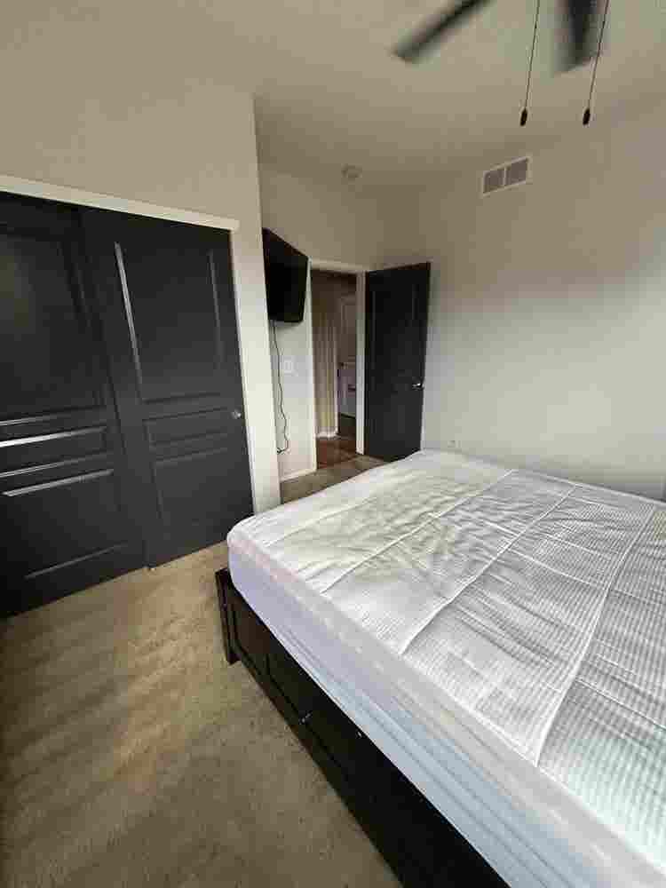 Furnished bedroom in large home