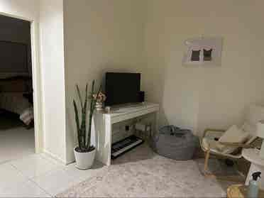 Furnished bedroom and living area