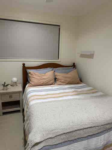 Furnished bedroom and living area