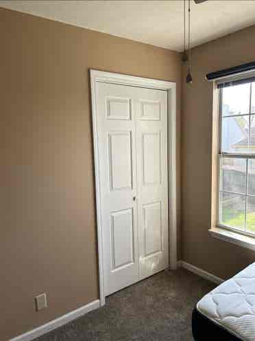Room with closet and private bath